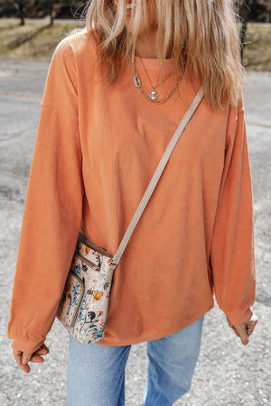 Orange Version – "Dolly Vibes Corduroy Sweatshirt"